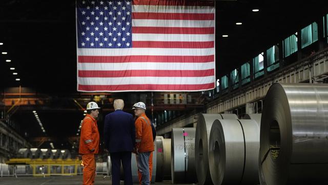 President Donald Trump talks to workers as he tours U.S. Steel Corporation's Mon Valley Works-Irvin plant, Friday, May 30, 2025, in West Mifflin, Pa. (AP Photo/Julia Demaree Nikhinson, File)