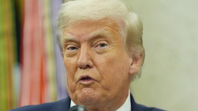 President Donald Trump makes an announcement about Apple in the Oval Office, Wednesday, Aug. 6, 2025, in Washington. (AP Photo/Alex Brandon)