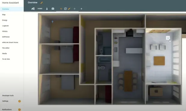 Screenshot of a home assistant dashboard displaying a floor plan with rooms, furniture, and navigation options on the side menu.