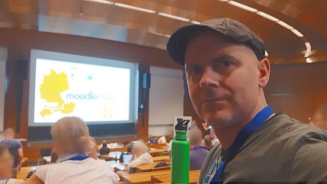 Selfie of the autor in the auditorium of the MoodleMoot D-A-CH conference at ETH Zürich.